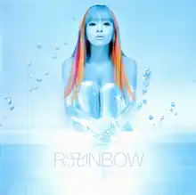 Ayumi Hamasaki shown looking into the camera, unclothed, hugging her knees to her chest, surrounded by bubbles. The entire image is in shades of light blue, with a strong neon glow effect, except for her side hair, which is in shades of orange and red, and flows down past her knees. Below her is written in all uppercase, "RAINBOW".