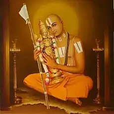 Ramanuja is one of the most important exponents of the Sri Vaishnavism tradition within Hinduism, depicted with Vaishnava Tilaka and Varadraja (Vishnu) statue.