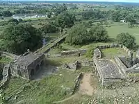 A view of the fort from the top showing fort walls and a moat