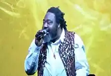 Ras Kimono with the mic