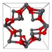 Alternating dark gray and red balls connected by dark gray-red cylinders