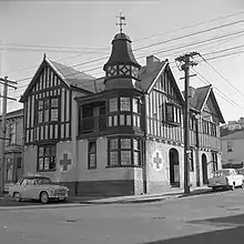 Black and white photograph of building in 1960.