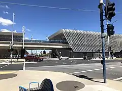 The newly elevated Reservoir railway station in the background.