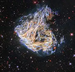 Revisiting a Celestial Fireworks Display Shreds, from the Wide Field Planetary Camera 2. The delicate sheets and intricate filaments are debris from the cataclysmic death of a massive star that once lived in the LMC.