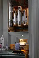 Jesus statue and the organ with organist Solbergsson (2018)