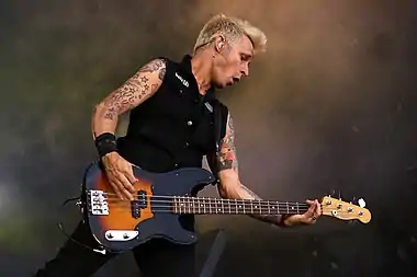 Dirnt performing with Green Day in 2013