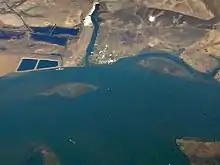 An aerial photo of some islands in water.