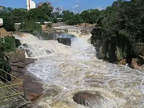 View of the Tietê River, through the dam of Salto