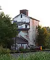 The grain elevator.