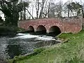 Bridge over the River Wensum outside the village