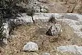 Rock-carved foundation of house in the Zanoah ruin