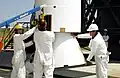 Technicians prepare a GEM 46 booster