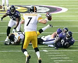 Ben Roethlisberger, Trevor Pryce (90), and Terrell Suggs (55) in 2006.