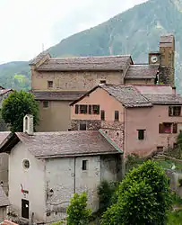 The church of Saint-Laurent and the town hall, in Roure