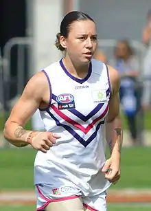 Roxanne Roux playing for Fremantle in 2021