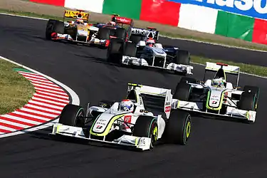 Rubens Barrichello, Jenson Button, Robert Kubica, Fernando Alonso and Heikki Kovalainen at the 2009 Japanese Grand Prix.