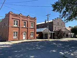 Rushville Hotel and Theater - Both built c.1910s The Rushville Theater (on right) features an auditorium on the second floor with a storefront on the ground floor.  The Rushville Hotel (on left) now serves as an apartment building.