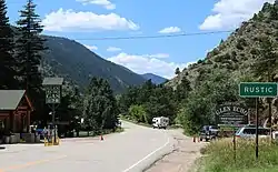 Rustic and Poudre Canyon Road, looking west