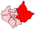 A very large constituency. It consists of the eastern portion of the county. It also includes the entirety of a second, smaller county, located to the east of the larger county.