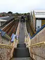 Viewed from the footbridge, looking at platforms 2 and 3, along with the depot building