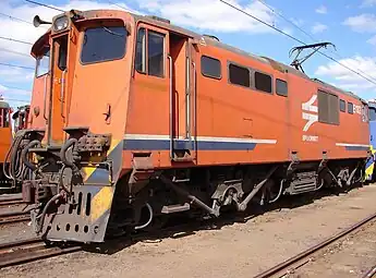 No. E1329 in Spoornet lined orange livery at Ladysmith, 5 August 2007