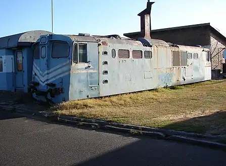 No. E1220's shell, repainted in SAR blue and whiskers livery and used as a clubhouse at Bellville Depot, 28 March 2009