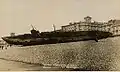 A postcard showing SM U-118 washed ashore.