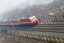 A Shaoshan SS7 electric locomotive on the electrified Longhai railway