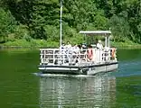 The ferry ship Welles transports passengers across the Saar near the Saarschleife.