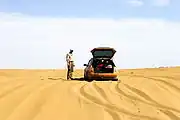 A desperate moment in the Sahara. An Audi A4 Avant gets captured by the soft desert sands.