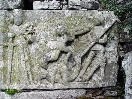 Saint Michael slays the dragon-devil, with 4 hands and horns. On left, Catherine of Alexandria with sword, crown, and wheel of martyrdom.