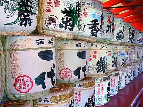 Barrels of sake, a traditional Japanese alcoholic drink, on display as an offering at an Itsukushima Shrine