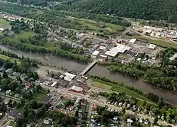 Downtown Salamanca looking north with the Allegheny River running through the middle and the Main Street Bridge toward the center.