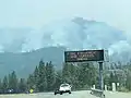 Salt Fire backing down the mountain near Gilman Rd. as seen from I-5 on July 4, 2021