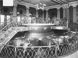 Baptismal font in the Salt Lake Temple of the LDS Church, ca. 1912. The twelve oxen supporting the font represent the Twelve Tribes of Israel.