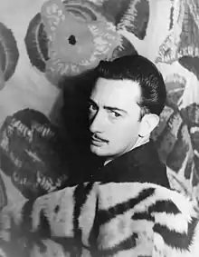 A grayscale 1939 photograph of painter Salvador Dalí