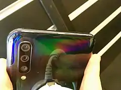 Smartphone with iridescent back panel