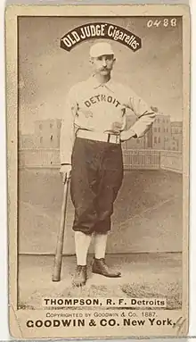 Standing man in baseball uniform