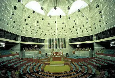 Image 1Jatiyo Sangsad Bhaban is the National Assembly Building of Bangladesh, located in the capital Dhaka. It was created by architect Louis I. Kahn and is one of the largest legislative complexes in the world. It houses all parliamentary activities of Bangladesh. This photo offers a view of the assembly hall inside the parliament buildingPhoto Credit: Rossi101