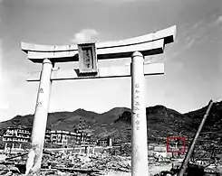 Torii, Nagasaki, Japan. One-legged torii in the background, October 1945