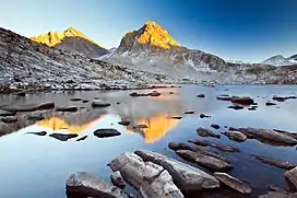 Mt. Fiske (left) and Mt. Huxley (center) reflected in Sapphire Lake at sunset