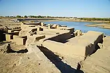 Ruins at a body of water