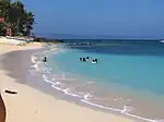 Saud Beach near Apo Idon resort. The Northwind Power windmills in neighboring Bangui can be seen in the distance.