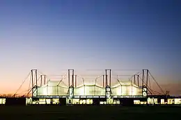 The Schlumberger Cambridge Research Centre, opened in 1985, was one of Hopkins' earliest buildings and shows his distinctive use of a suspended, high-tech, fabric roof.