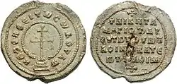 Lead seal with cross surrounded by legend on the obverse and a simple legend in the reverse