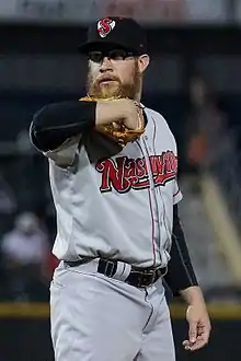 A baseball player in gray