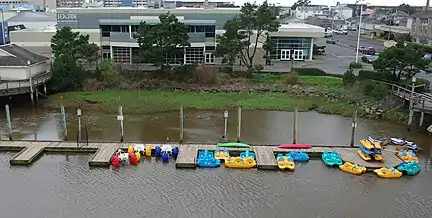 Seaside Convention Center with boat rental pier