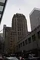 Looking south down 6th Avenue towards the building