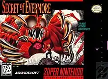 The game's cover art shows a boy and his dog standing on a ledge face-to-face with a giant, red creature with insectoid eyes, sharp teeth, a visible heart, and a ribcage resembling claws. The game's logo and various other logos are visible around the artwork.