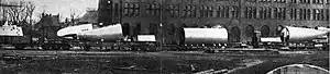 Sections of UB-13 on board railroad flatcars for transport to Antwerp in early 1915